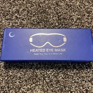 Heated eye mask
